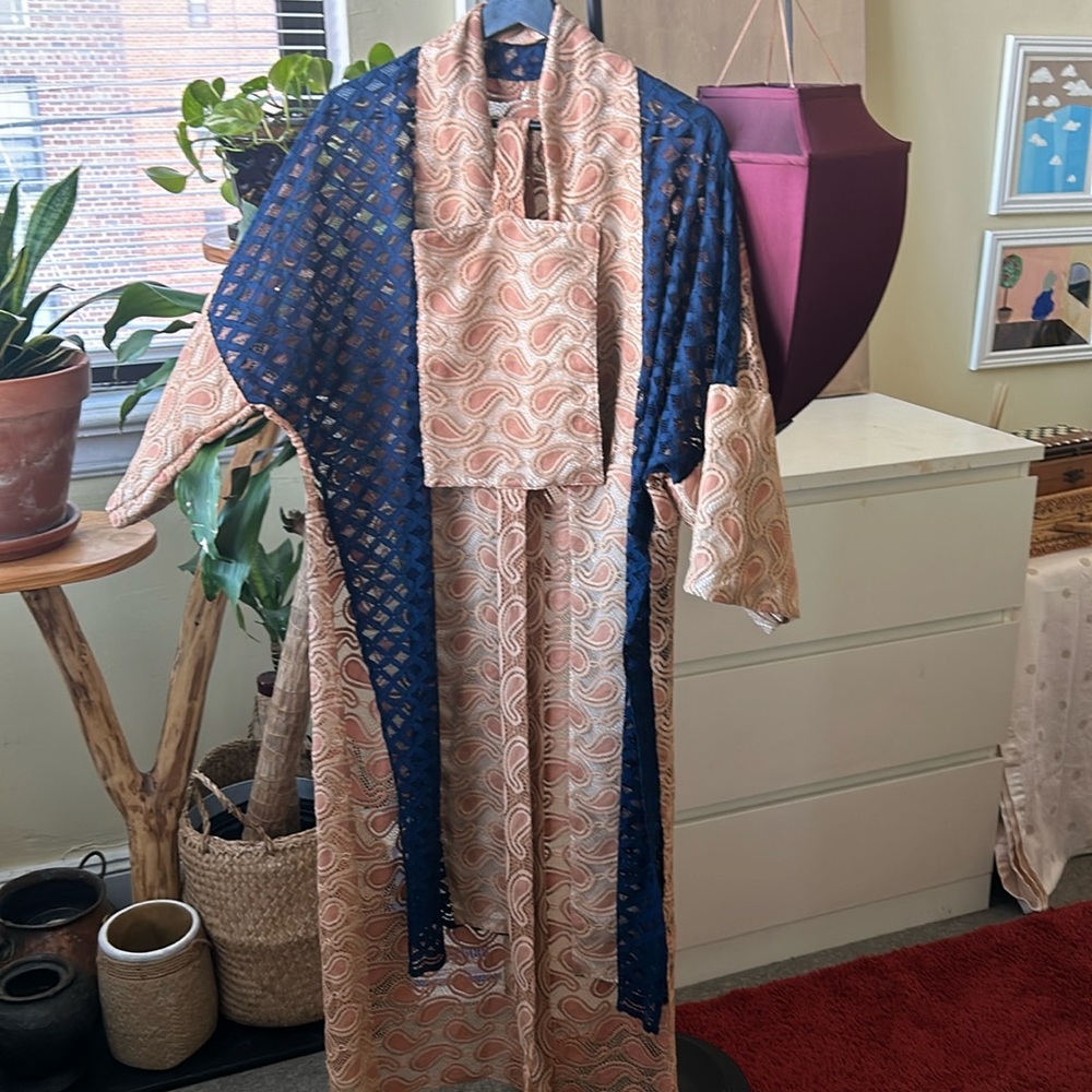Carmel peach and navy blue outerwear with same fabric belt in good condition